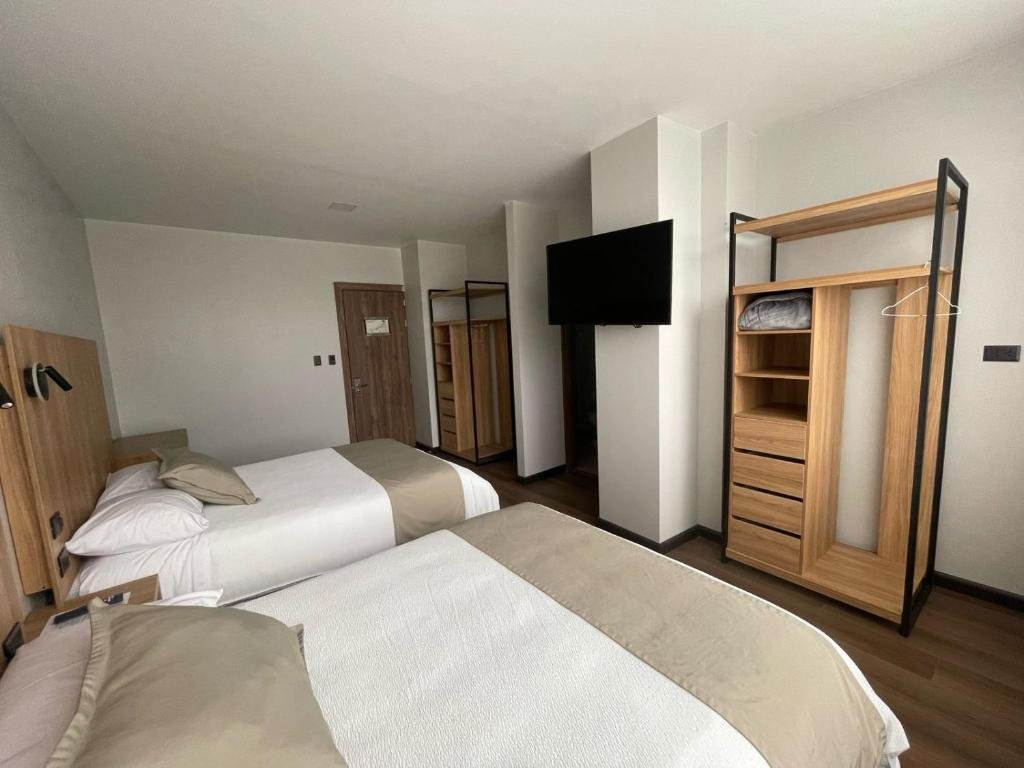 Habitación doble con cama matrimonial